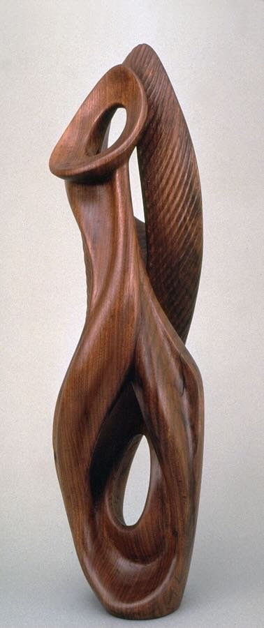 An organic Black Walnut wood Sculpture called Growth by Douglas Bechler
